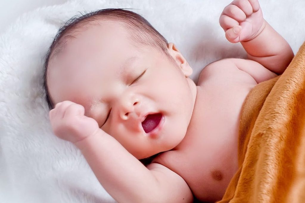 Retained primitive reflex Baby Lying On White Fur With Brown Blanket. Retained Primitive Reflex